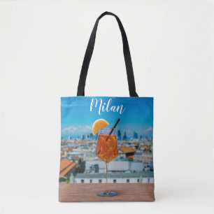 Spritz cocktail on a table with view of Milan Tote Bag