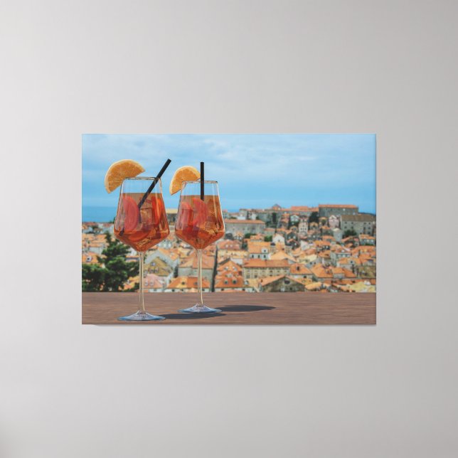 Spritz cocktails against red roofs in Dubrovnik Canvas Print (Front)