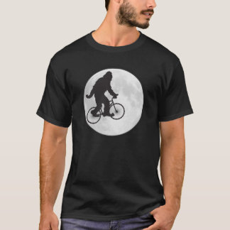 Squatch sur un vélo dans le ciel avec un T-shirt d