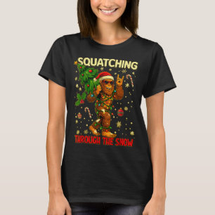 Squatching Through The Snow Funny Bigfoot Xmas Lig T-Shirt