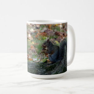 Squirrel holding a nut coffee mug