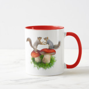 Squirrels Dancing on Red Mushrooms Mug