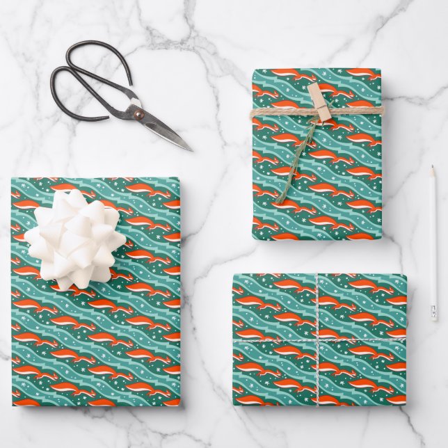 Squirrels jumping in the snow on a Christmas tree Wrapping Paper Sheet (Front)
