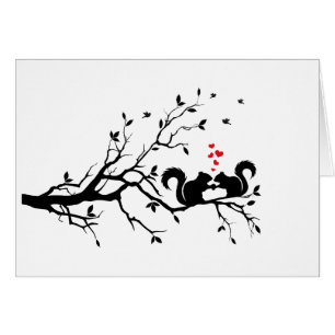 Squrrels avec les coeurs rouges sur la branche