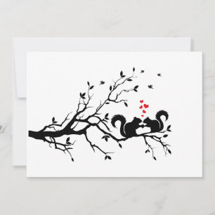 Squrrels with red hearts on tree branch