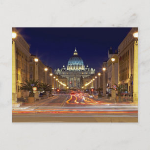 St Peter's Basilica toward end of road at night Postcard