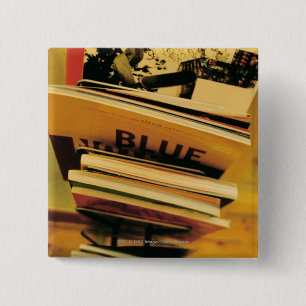 Stack of books and magazines 2 inch square button