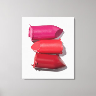 Stack of broken lipstick canvas print