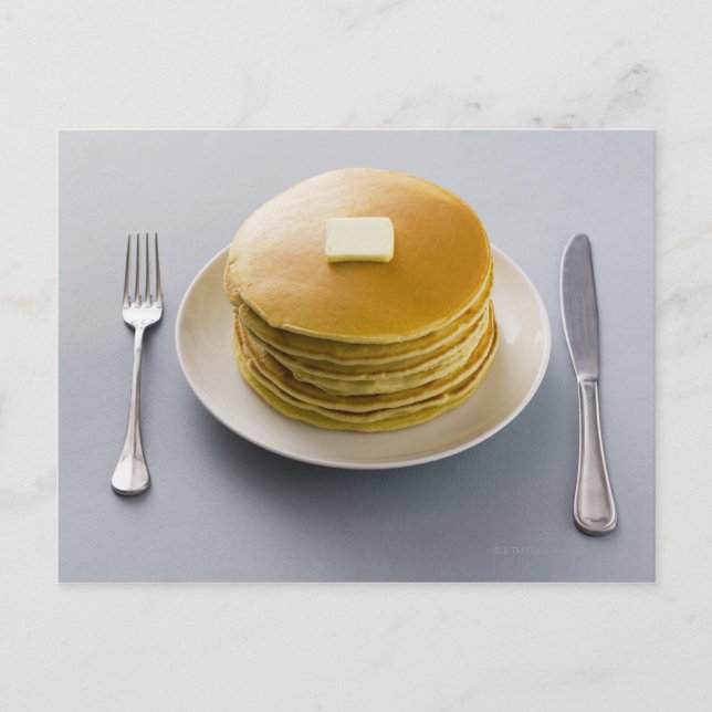Stack of pancakes with butter on a plate postcard (Front)
