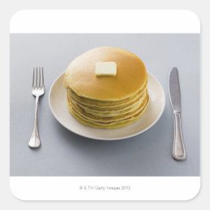 Stack of pancakes with butter on a plate square sticker