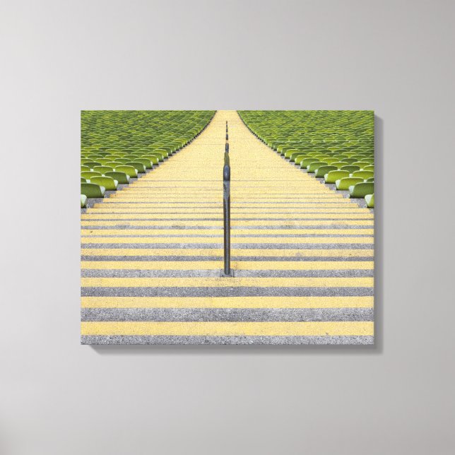 Stadium stairway between rows of green seats canvas print (Front)