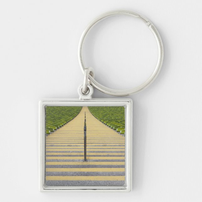 Stadium stairway between rows of green seats keychain (Front)