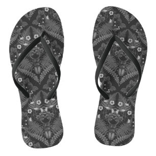Stag beetle and ferns, in black and white flip flops