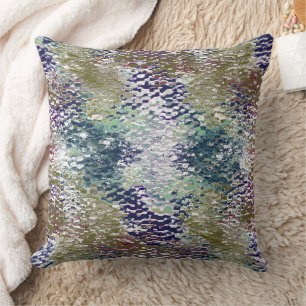 Stains and splatters of paint under hammered glass throw pillow
