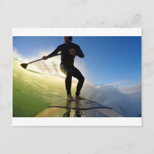 Stand up paddle board surfing a green wave postcard