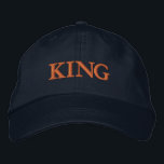 Standout KING Text Adjustable Navy-Hat for Comfort Embroidered Hat<br><div class="desc">Add a touch of personality to your look with the Custom KING Text Printed Adjustable Cap. This navy hat features a strong "KING" embroidery, offering an eye-catching focal point. The adjustable design ensures the perfect fit for all-day wear and comfort.</div>