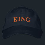 Standout KING Text Adjustable Navy-Hat for Comfort Embroidered Hat<br><div class="desc">Add a touch of personality to your look with the Custom KING Text Printed Adjustable Cap. This navy hat features a strong "KING" embroidery, offering an eye-catching focal point. The adjustable design ensures the perfect fit for all-day wear and comfort.</div>