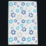 Star of David Medium Gift Bag<br><div class="desc">This fabulous gift bag would be perfect for any gift you are giving at Hanukkah.  It's beautiful and modern design with multi-sized Stars of David in turquoise,  blue and silver is clean and simple,  festive and fun!  Get enough to wrap all your gifts.</div>