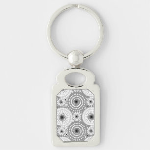 Starbursts and pinwheels, grey, black and white keychain
