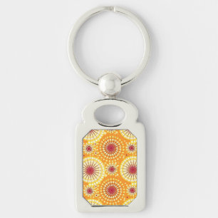 Starbursts and pinwheels, saffron and raisin keychain