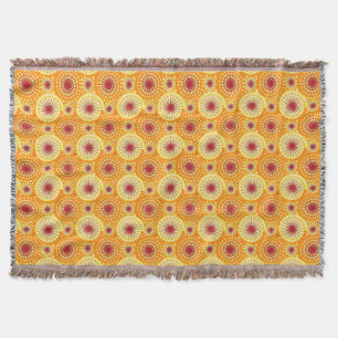 Starbursts and pinwheels, saffron and raisin throw blanket