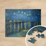 Starry Night Over the Rhône | Vincent van Gogh Jigsaw Puzzle<br><div class="desc">Starry Night Over the Rhône (1888) by Vincent van Gogh is a mesmerizing Post-Impressionist painting that captures a serene nighttime view of the Rhône River in Arles, France. The artwork features a deep blue sky adorned with shimmering golden stars and their reflections on the water. In the foreground, two figures...</div>