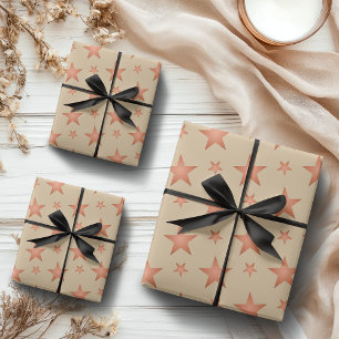 Starry pattern in gradient terracotta orange wrapping paper sheet