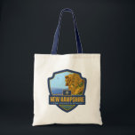 State Pride | New Hampshire Tote Bag<br><div class="desc">Anderson Design Group is an award-winning illustration and design firm in Nashville,  Tennessee. Founder Joel Anderson directs a team of talented artists to create original poster art that looks like classic vintage advertising prints from the 1920s to the 1960s.</div>