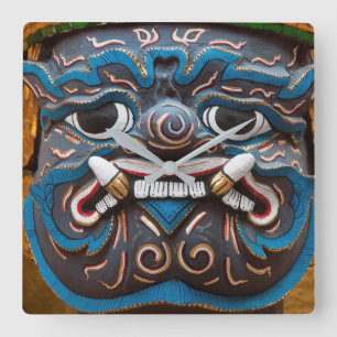 Statue Face at the Grand Palace Square Wall Clock