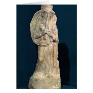 Statuette of a woman playing a double flute
