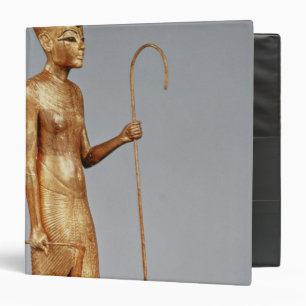 Statuette of king wearing the red crown of binder