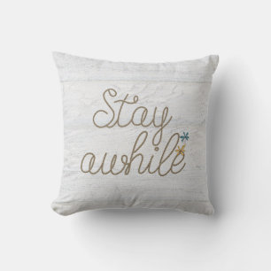Stay Awhile nautical rope text on rustic wood Throw Pillow