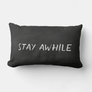 Stay Awhile quote on black chalkboard Lumbar Pillow