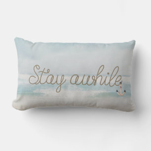 Stay Awhile rope text with anchor on ocean Lumbar Pillow