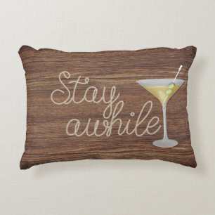 "stay awhile" rope with martini on wood accent pillow