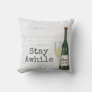 Stay Awhile Wine Bottle On Wood    Throw Pillow