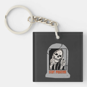 STAY POSITIVE SKELETON KEYCHAIN