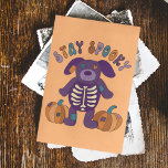 Stay Spooky Cute Skeleton Dog Halloween Postcard<br><div class="desc">The message on the front of this postcard reads STAY SPOOKY above a cute illustration of a patchwork style stuffed dog with a skeleton visible on his belly and a couple of patchwork pumpkins. The back of this card is blank so that you can write in your own message.</div>