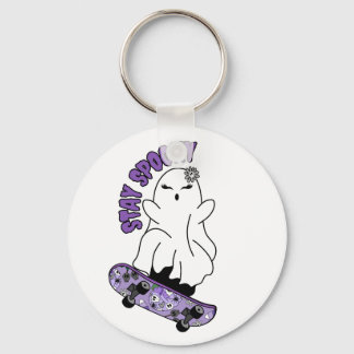 "Stay Spooky" Ghost on a Skateboard – Cool Purple Keychain