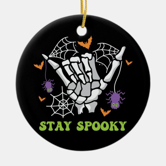 Stay Spooky with Hand Bones and Spider Webs Ceramic Ornament (Front)