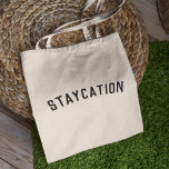 Staycation | Modern Minimalist Stylish Trendy Tote Bag<br><div class="desc">Simple, stylish "Staycation" custom quote art tote bag with modern, minimalist typography in black in a bold trendy style. The perfect gift or accessory for a vacation at home during the covid-19 coronavirus pandemic during periods of lockdown and travel restrictions.The words can easily be personalized with your own message for...</div>