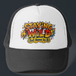 Staying Wild But Home by 8 Comic Pop Art Trucker Hat<br><div class="desc">Embrace your inner party animal—provided the party ends before the nightly news. This hilarious "Staying Wild (But Home by 8)" design features a vibrant, high-energy comic book pop art aesthetic, complete with bold action bursts, lightning bolts, and retro-style typography. It is the ultimate statement piece for anyone who still has...</div>