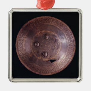 Steel shield with intricate gold decoration