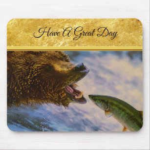 Steelhead salmon jumping into grizzly bears mouth mouse pad