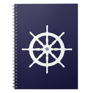 Steering wheel on navy blue background. notebook