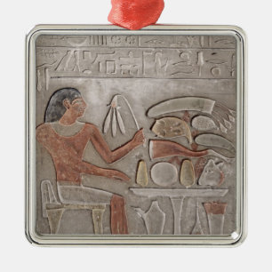 Stela depicting the deceased metal ornament