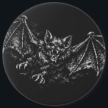 Sticker 6 Inch Round Button<br><div class="desc">A stark black‑and‑white vampire bat rendered in haunted ink, wings stretched to full span and etched with razor‑fine texture. The creature hangs in the air like a living sigil, its face carved in feral detail and its presence radiating nocturnal menace. This artwork carries the signature BurnsInHell mythic‑ink style, built for...</div>