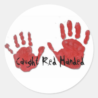 Sticker à main rouge pris