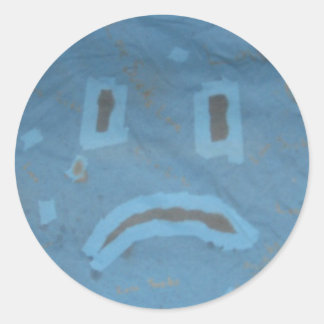 Sticker à visage triste