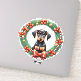 Sticker Adorable Coupe Doberman de Noël dans une couronne